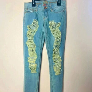 Ripped light blue skinny jeans